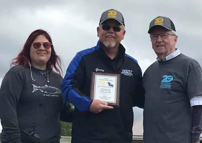 NIT driver Gerald Graves, center, won first place in Alaska's sleeper berth class. (Image Courtesy of Alaska Trucking Association/Facebook)