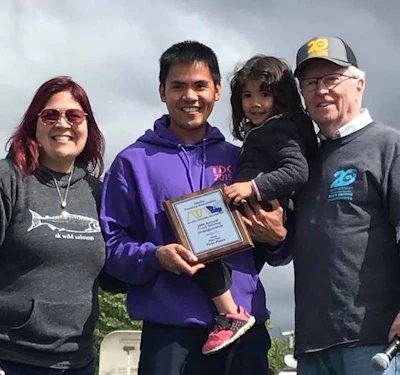 FedEx driver Jerome De Le Cruz, center, won first place in Alaska's step van class. (Image Courtesy of Alaska Trucking Association/Facebook)