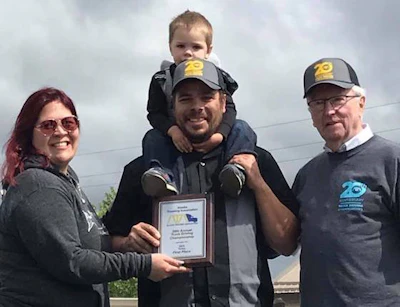 Carlile driver Jeremy Walton, center, won first place in Alaska's twins class. (Image Courtesy of Alaska Trucking Association/Facebook)