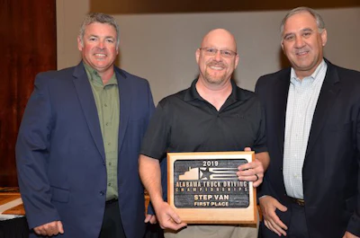 FedEx Freight driver Robert Moore, center, won first place in Alabama's step van class. (Image Courtesy of Alabama Trucking Association/Facebook)