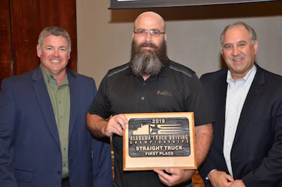 FedEx Freight driver William Brandon, center, won first place in Alabama's straight truck class. (Image Courtesy of Alabama Trucking Association/Facebook)