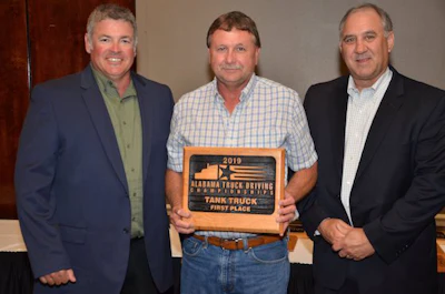 FedEx Freight driver Kenneth Lockhart, center, won first place in Alabama's tanker class. (Image Courtesy of Alabama Trucking Association/Facebook)