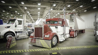 Jeff Jansen and V-Max Transportation’s 1995 Kenworth W900L and 2016 Utility van, “Backlash,” won Best of Show in the Limited Mileage Combo category.
