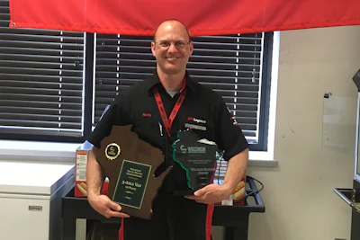 XPO Logistics driver Barry Kraimer won first place in the 3-axle class and was named grand champion. (Image Courtesy of Wisconsin Motor Carriers Association)