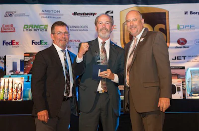Walmart Transportation’s Mike White, center, was named Indiana’s grand champion. (Image Courtesy of Indiana Motor Truck Association)