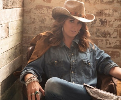 Australian country rocker Jayne Denham unveils her new single “Black Coffee and White Lines at the show Friday