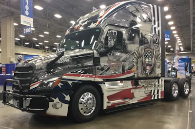 The D Day tribute truck at thee Crete Carrier and Shaffer Trucking booth