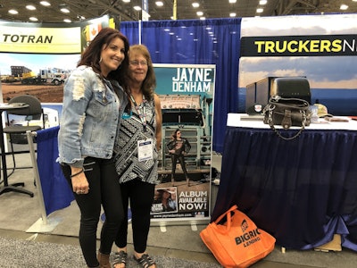 Jayne Denham stopped by the Truckers News booth at GATS to greet fans and autograph merchandise.