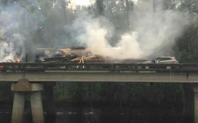 Five tractor-trailers and a car were involved in a crash on Interstate 10 in Louisiana Monday afternoon. (Henderson Fire Department photos)