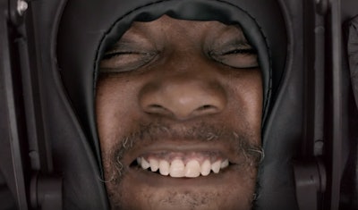 A trucker getting adjusted by Dr. Beau Hightower (Volvo image)