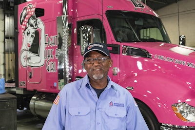 Boyd Bros. driver Myron Moffett drivers the fleet’s recently designed breast cancer awareness truck. (Image Courtesy of Boyd Bros.)