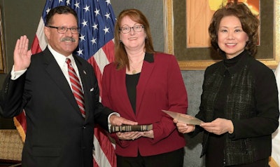 Ray Martinez sworn in as FMCSA Administrator by DOT Secretary Elaine Chao.