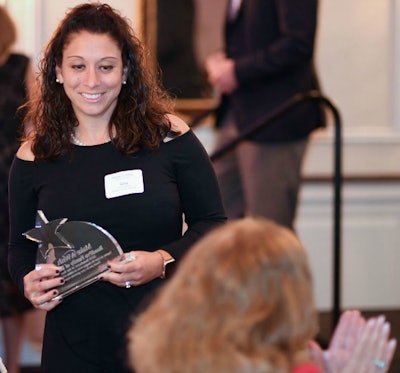 Gina Bonafede accepts the Benefactor of the Year Awar on behalf of the RoadPro Family of Brands.