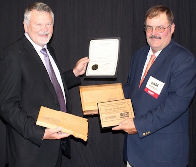 YRC Freight Customer Service Director Rick Hoogendoorn (left) and YRC Freight driver Wade Wagemann celebrate “Wade Wagemann Day” in South Dakota. (Image Courtesy of YRC Freight)