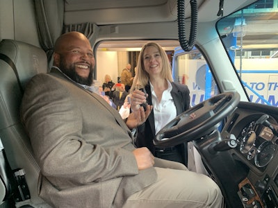 Joseph Campbell and Lisa Berreth, Kenworth’s marketing director, check out Campbell’s new Kenworth T680.