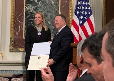 Sec. Pompeo presented Paris with the award during an Interagency Task Force meeting. (Image Courtesy of Facebook/Truckers Against Trafficking)