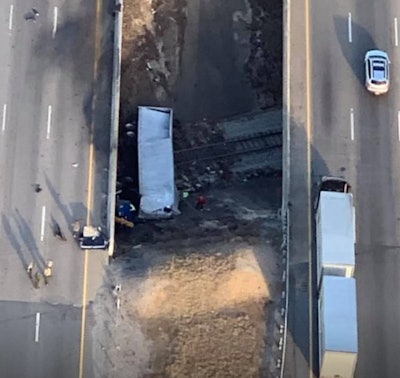 A tractor-trailer left Interstate 40 last week and landed on railroad tracks. (Tennessee Highway Patrol photo)