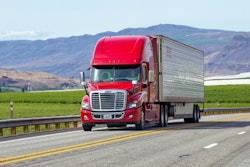 red-truck-on-highway-2