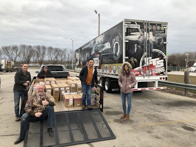 Curt Reitz (CTS president) in front Paul Hajny, in the very back is Jory Gennett, and Hiep Nguyen is standing on the trailer (these 3 are reps from foundations, the foster care organization), Rachel McCain (CTS) on far right.