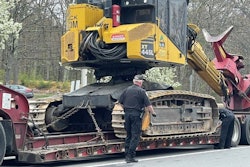 A New Hampshire Trooper inspects a tractor-trailer during the recent International Roadcheck.