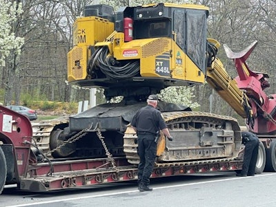 A New Hampshire Trooper inspects a tractor-trailer during the recent International Roadcheck.