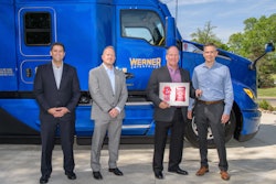 At far right, Kevin Baney, Kenworth general manager and PACCAR vice president, presents the keys – and a plaque signifying the delivery of the first production T680 Next Gen – to Scott Reed, Werner Enterprises senior vice president of equipment purchasing and maintenance. From far left are Corey Murphy, vice president of MHC Kenworth Iowa/Nebraska/Illinois, representing selling dealer MHC Kenworth – Omaha; and Tony Wahl, Werner Enterprises director of equipment purchasing.