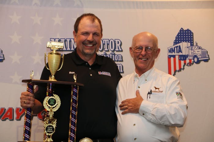 Ron Round (left) was named the Grand Champion of the ATA National Truck Driving Championships.