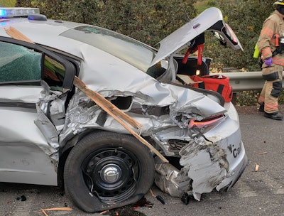 An Oregon State Police car was struck on I-84 recently while stopped to ai a disabled vehicle.
