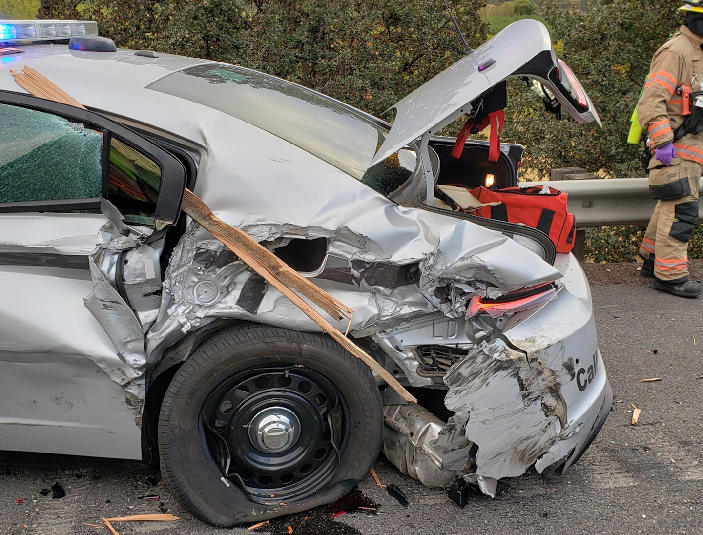 An Oregon State Police car was struck on I-84 recently while stopped to ai a disabled vehicle.