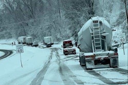 The Virginia State Police posted to Facebook: 'This was the scene this AM in the community of Lovingston in Nelson County, where VSP troopers, area wreckers, Virginia Department of Transportation crews & Nelson County Sheriff's Office worked for several hours to free more than a dozen stuck/disabled tractor-trailers in the northbound lanes of Route 29. The snow's quick, heavy downfall made this stretch of Route 29 treacherous and impassable for all drivers. Passenger & commercial vehicles are still advised to avoid using Route 29 through Nelson County until weather and road conditions improve.'