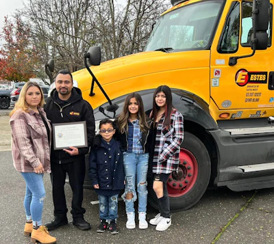 Efrain Angel Zepeda and his family with his award