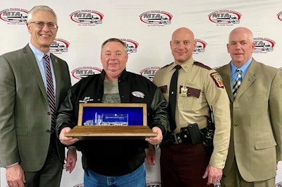 L-R: MTA president John Hausladen; Jerry Stephens, Autumn Transport; Captain Jon Olsen, Minnesota State Patrol; Matt Marrin, FMCSA.