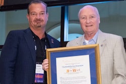 John Elliott, left, is pictured with past TCA Chairman, and incoming TCA President, Jim Ward.