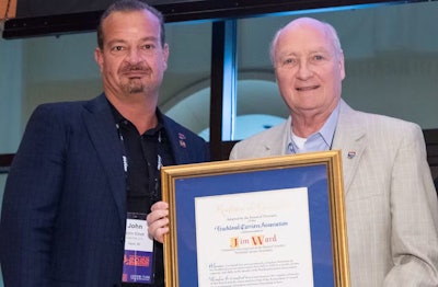 John Elliott, left, is pictured with past TCA Chairman, and incoming TCA President, Jim Ward.