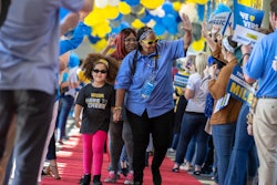 J.B. Hunt Dedicated driver Edwina and her family participate in the Million Mile Walk of Fame at corporate headquarters in Lowell. She is the first female driver to achieve three million safe miles in company history.