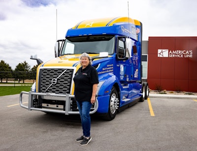 Carmen Anderson, America’s Service Line professional driver, and the Volvo VNL760 that she’ll now be operating to help raise awareness and support of Special Olympics.