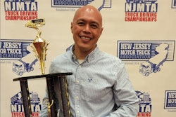 Truck driver with trophy