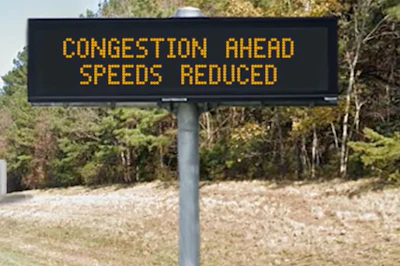 Reduce speed sign