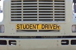 truck with student driver sign