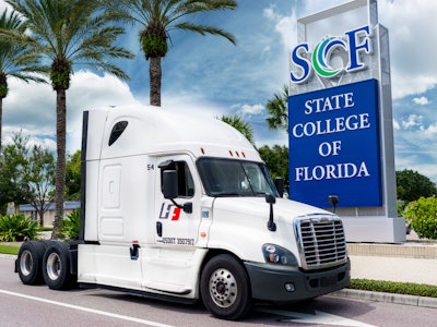 Truck in front of State College of Florida sign