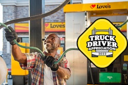 Truck driver at fuel pump
