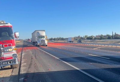 Tomatoes spilled on highway