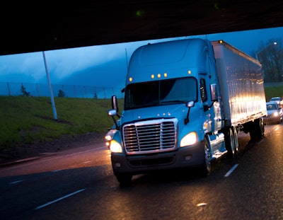 big rig on highway at night