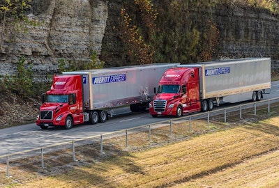 Two tractor-trailers on highway