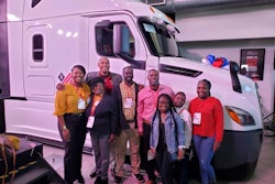 Family with Freightliner Cascadia
