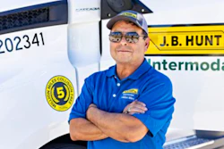 truck driver in front of truck
