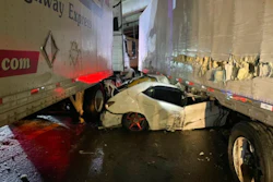 Car crushed between 2 tractor-trailers