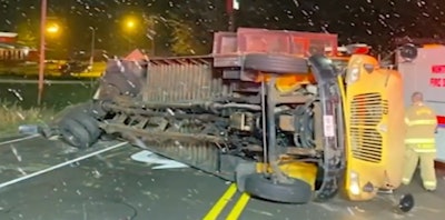 School bus on its side after an accident with a tract-trailer