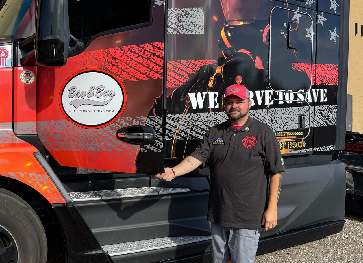 Truck driver with his truck