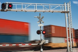 SHIPPING CONTAINERS ON RAIL CARS